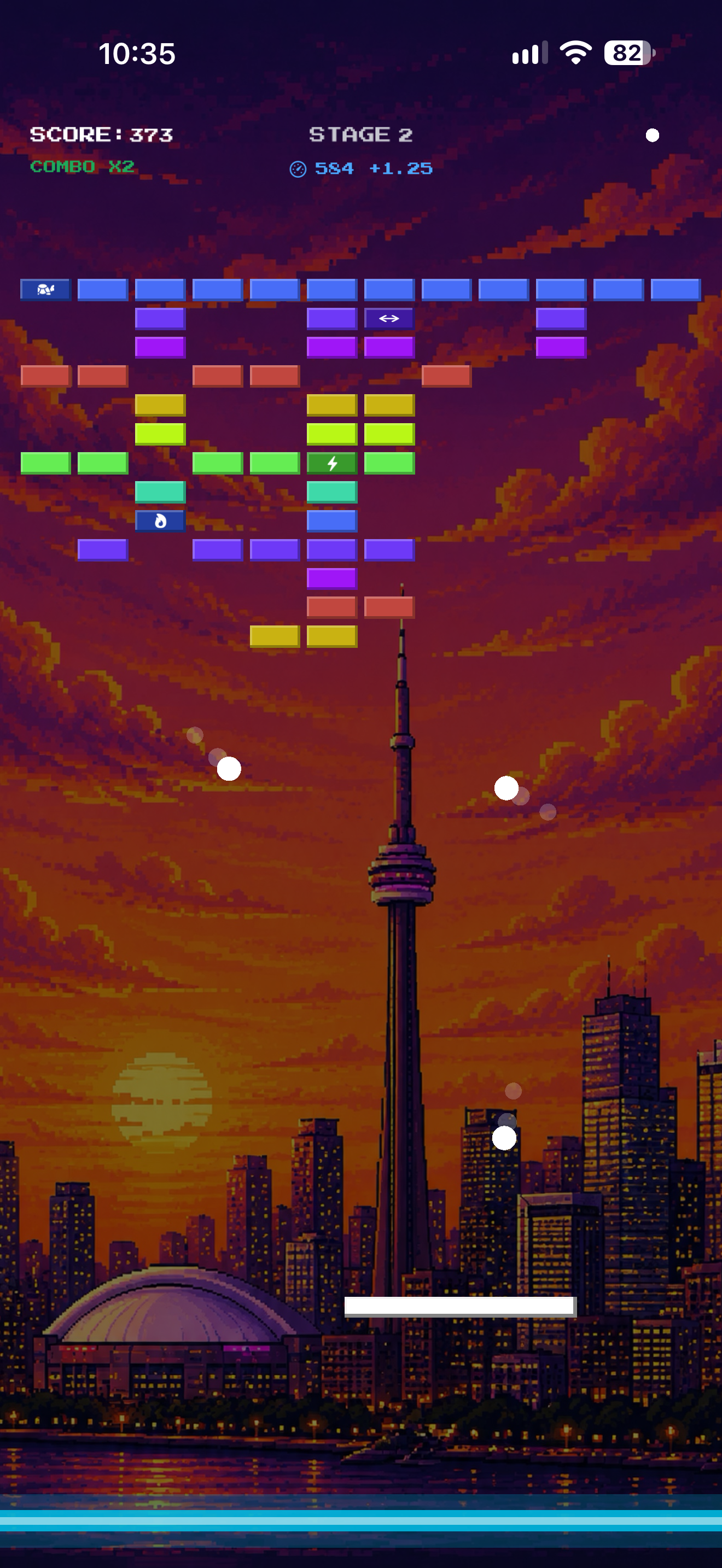 Multiball active on a stage 2 board, three balls in play over a Toronto skyline wallpaper.