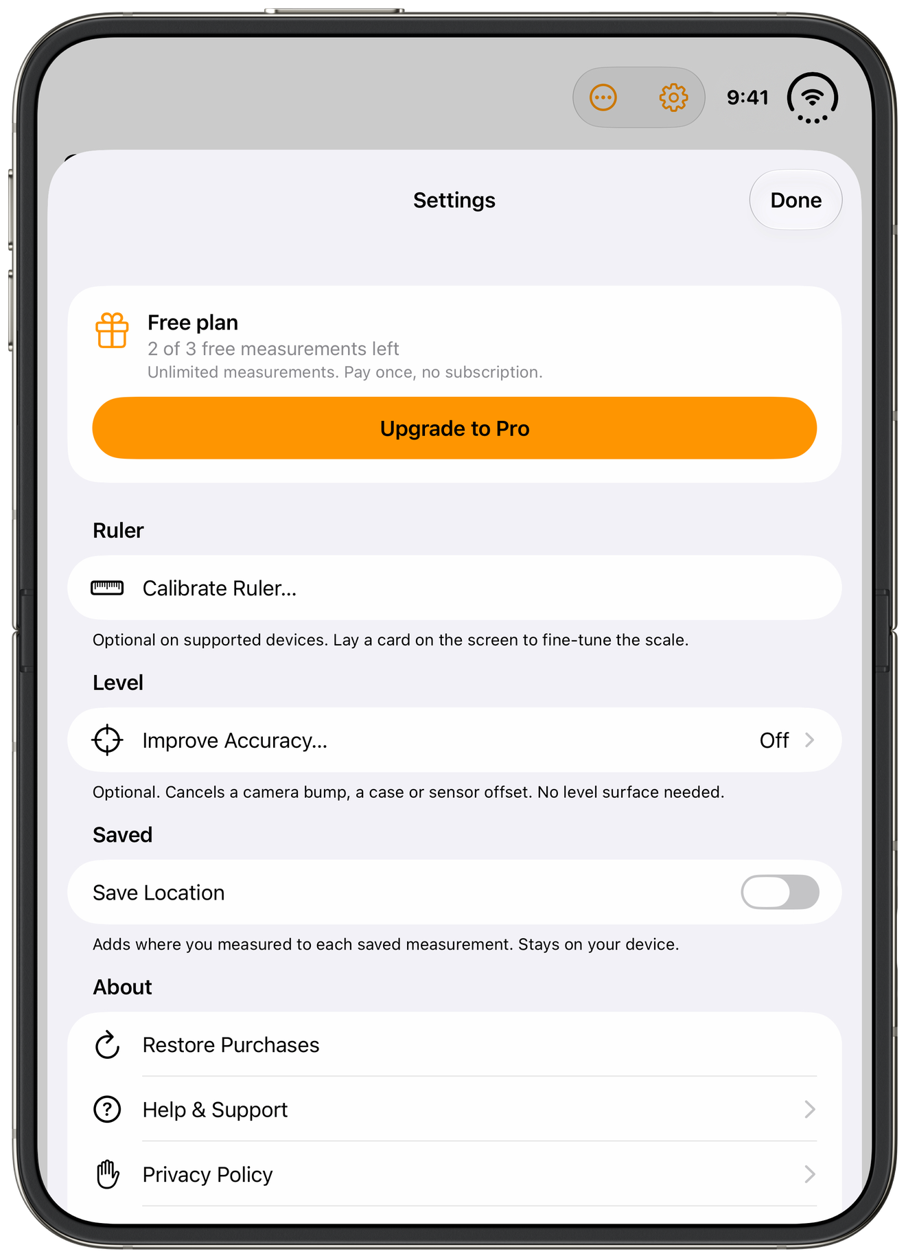Measure's Settings on an unfolded iPhone Duo, with the free plan, Calibrate Ruler, Improve Accuracy and Save Location in one view.